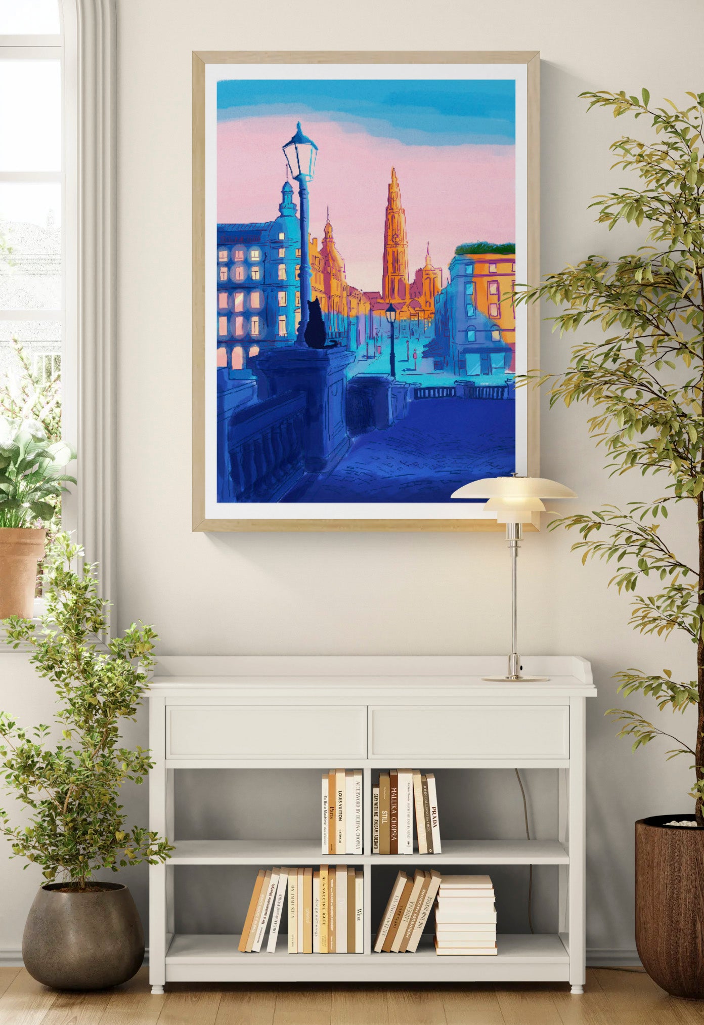 Vertical giclée art print by Valeria Maggiani showing a colourful view towards Antwerp Cathedral, with a seated black cat, deep blue streets and a pink sky, ideal for contemporary wall decor.