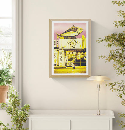 Japanese risograph art print of a red and yellow fish storefront scene by PTRVRKD, A3 limited edition wall art, vibrant neon Japanese street illustration, modern Japan-inspired risograph poster for home decor, contemporary Asian urban artwork Netherlands artist.