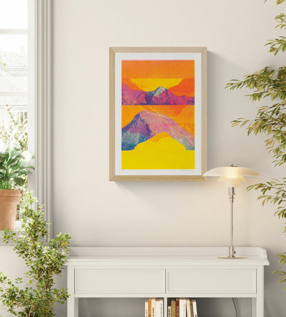Mountain Landscape - Komodo by PTRVRKD, vertical A3 risograph print featuring layered mountains in vivid orange, yellow, pink and blue, ideal as colourful contemporary wall art.