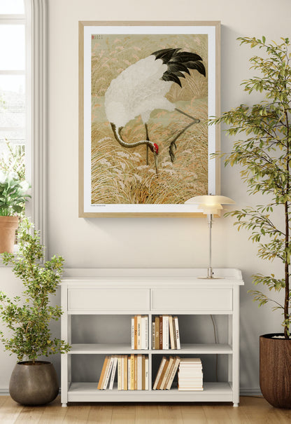 Sarus crane standing among tall rice grasses and flowering plants in muted beige, cream, black and coral tones, Japanese-inspired vertical digital art print for elegant wall decor.