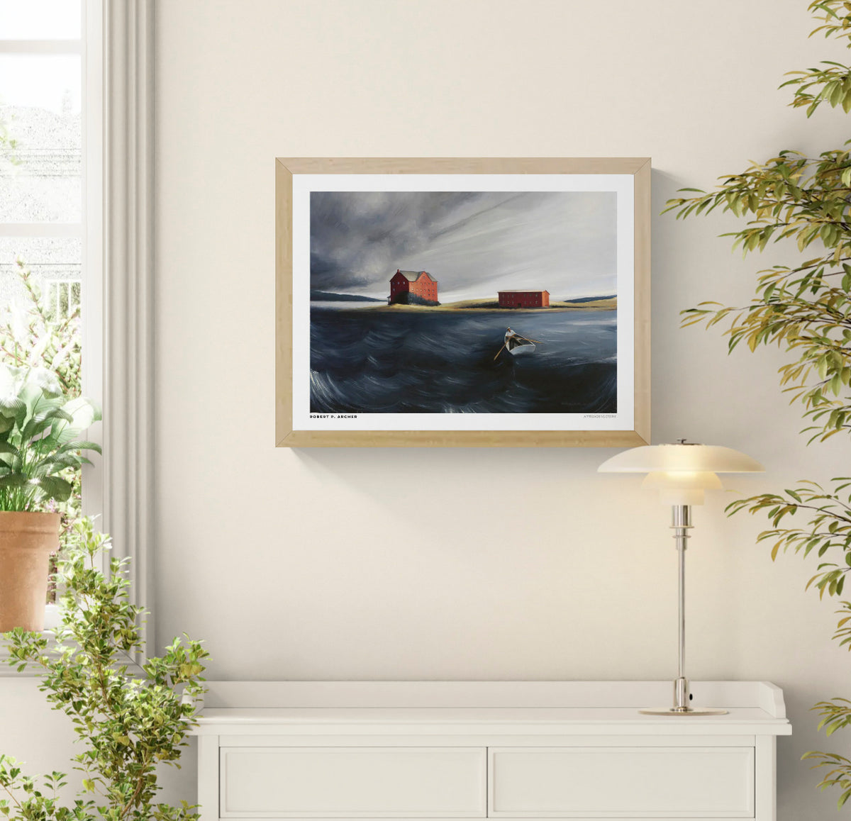 Approaching Storm by Robert P. Archer, horizontal coastal scene with a lone rower on dark blue water, red buildings and a grey storm sky; digital print for living room or study wall decor.