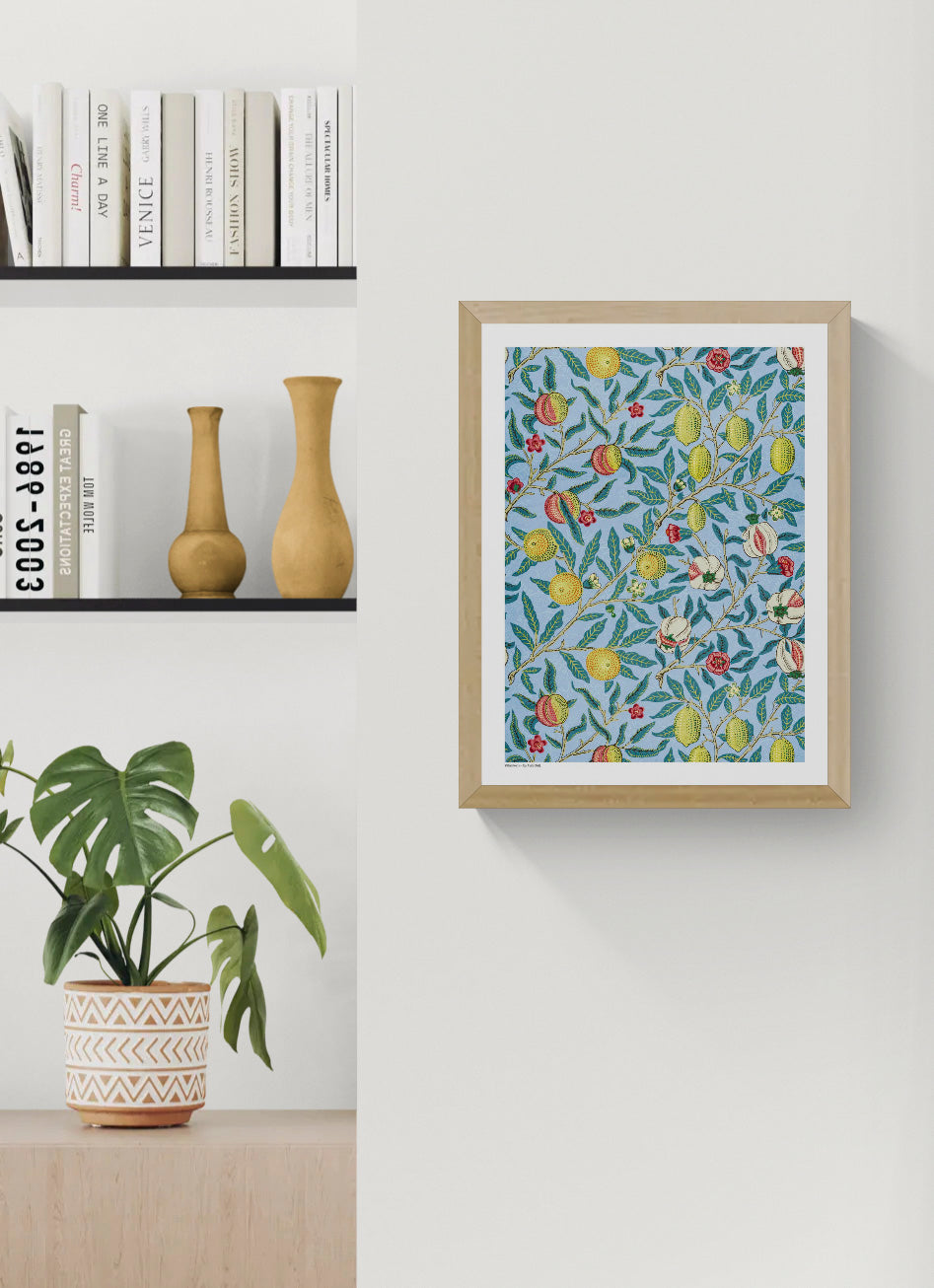 Four Fruits by William Morris, vertical botanical digital print with citrus fruits, pomegranates, flowers and green leaves on a light blue background, ideal as colorful wall art.