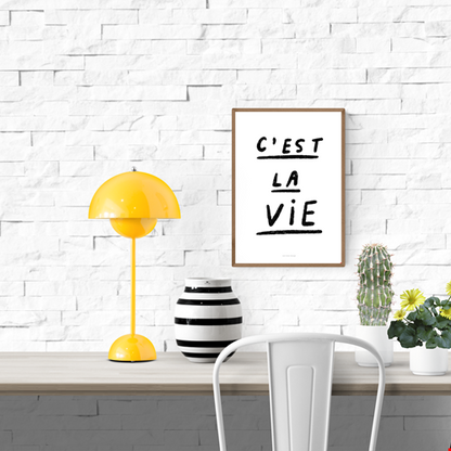 Black and white minimalist art print with handwritten French quote 'C'est la vie' by Just Cool Design – modern typography wall art for contemporary interiors, available at Galerie Frits