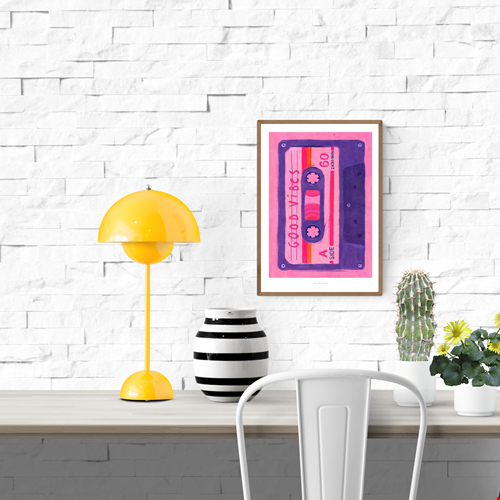 Colorful Giclée art print of a retro pink and purple cassette tape labeled “Good Vibes,” designed by Just Cool Design. 80s-inspired wall art that adds cheerful, nostalgic energy to modern interiors—perfect for music lovers and vintage decor fans.