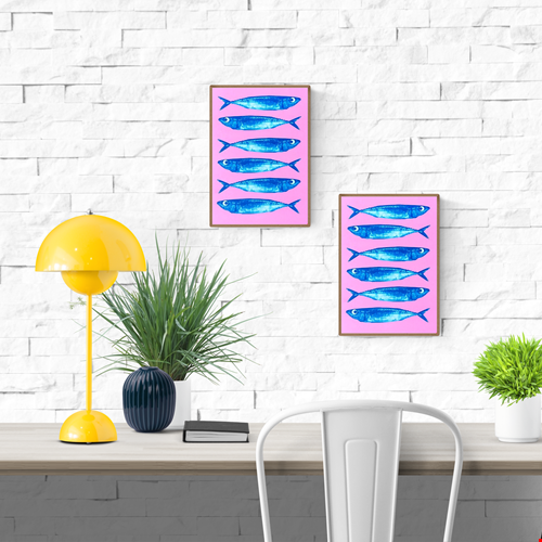 Bright pink and blue offset print of sardines by Dutch illustrator PTRVRKD – playful modern seafood illustration with seven blue fish on bold pink background, printed with eco-friendly soy inks on 250 gsm Biotop paper, handmade in the Netherlands – quirky small art print for kitchens or walls.