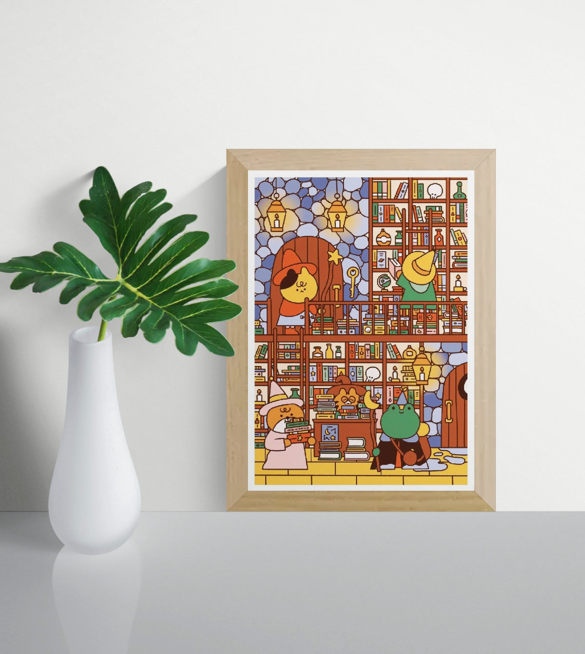 Wizard's Library by Niniwanted, A4 vertical digital art print featuring cute animal wizards, colorful bookshelves, glowing lanterns, and magical objects in a cozy fantasy library. Playful kawaii wall art.