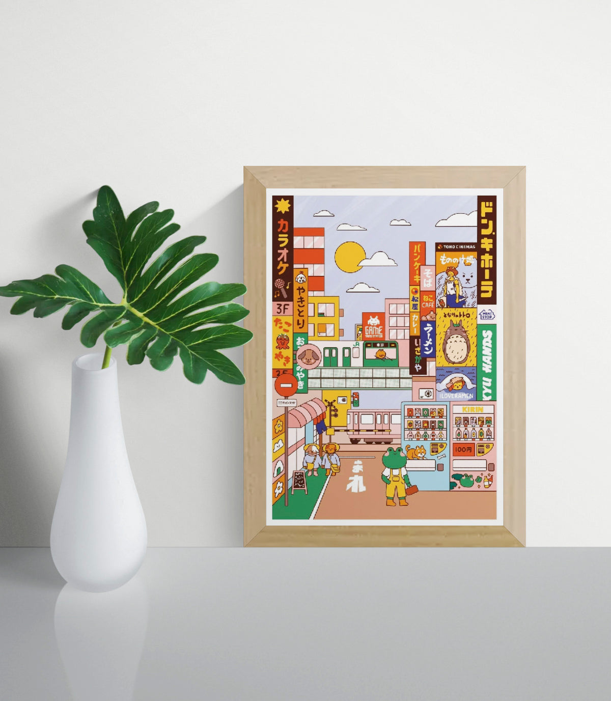 Day in Tokyo by Niniwanted, colorful A4 digital art print featuring a playful Japanese street scene with kawaii animals, ramen signs, trains, and vending machines in a pastel cartoon style.