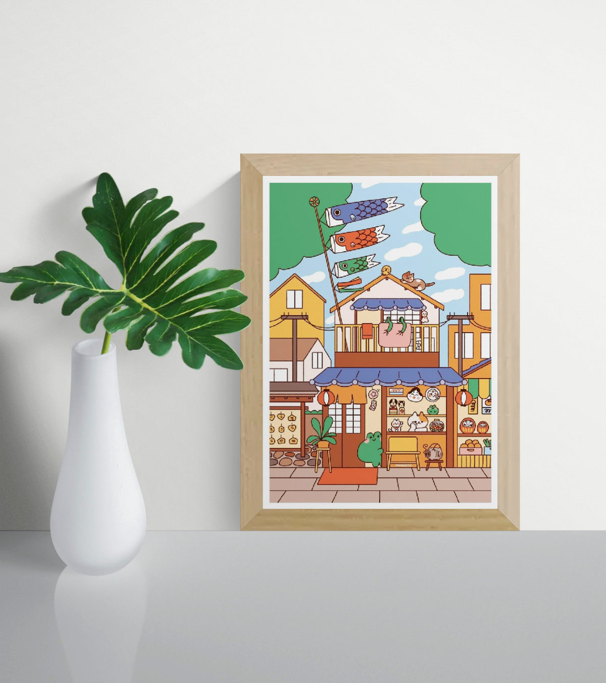 Colorful vertical digital art print of a Japanese souvenir shop by Niniwanted, featuring koi flags, lucky cats, lanterns, and playful characters. Kawaii wall art in warm orange, blue, and green.