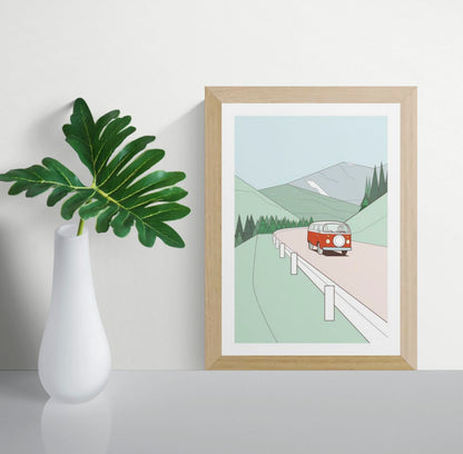 Minimalist art print of a red vintage van driving through green hills with pine trees and mountains in the background – travel-themed illustration by Floor 4 Productions