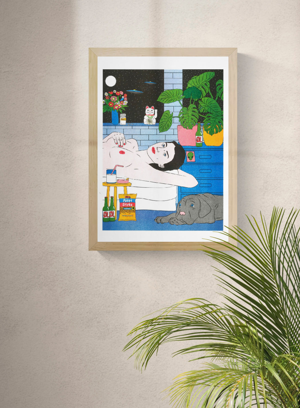 Colourful vertical risograph by Kine Andersen showing a reclining woman with a grey dog, tropical plants, flowers, beer bottles and UFOs, in blue, green, red and yellow tones, ideal as playful wall art.