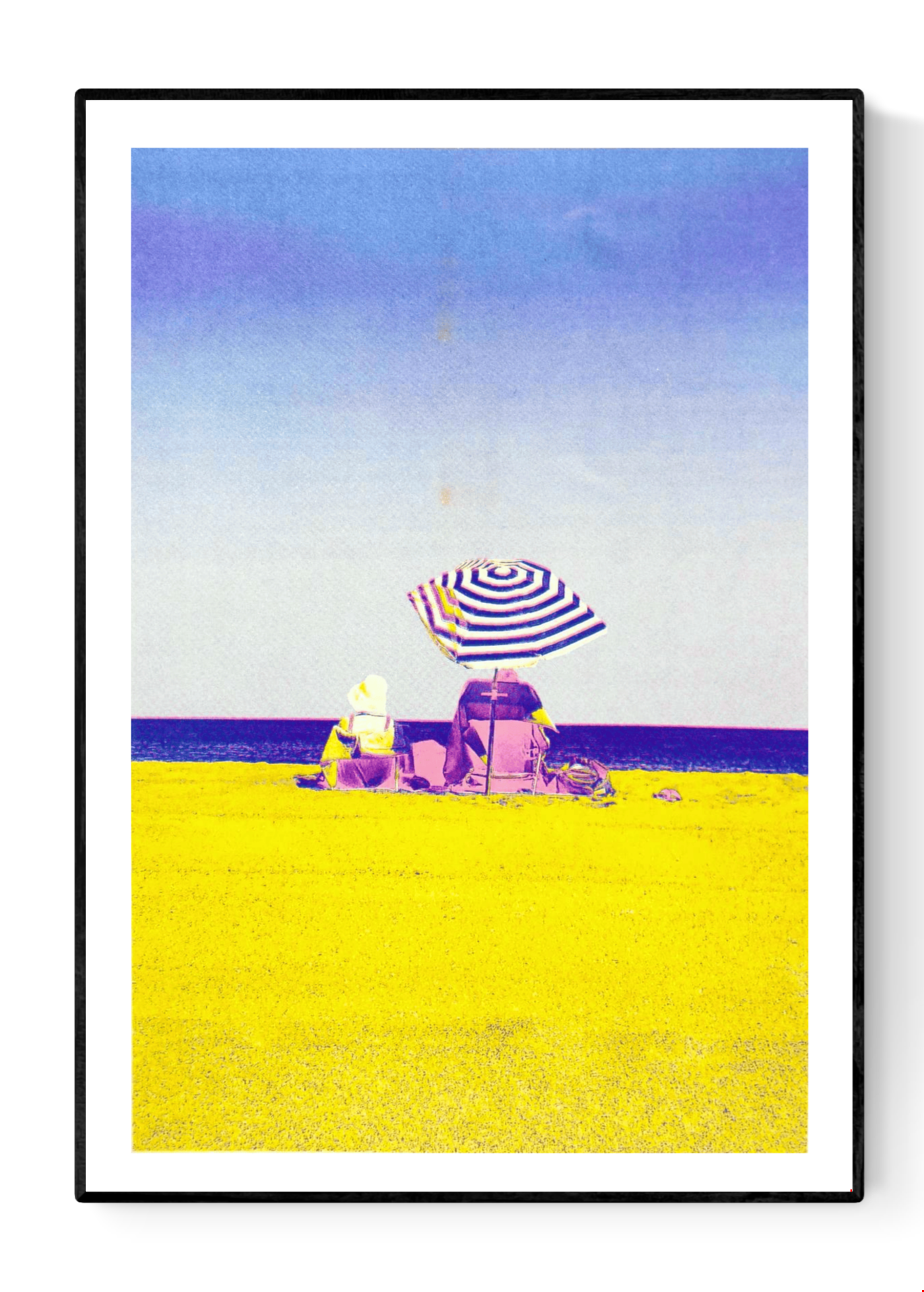 Colorful risograph art print titled “Basque Beach” by PTRVRKD, featuring two people sitting under a striped umbrella on a bright yellow beach with a soft blue-purple sky; A3 limited edition printed on Munken Pure Rough paper. Vibrant modern beach artwork ideal for coastal decor and contemporary wall art collectors.