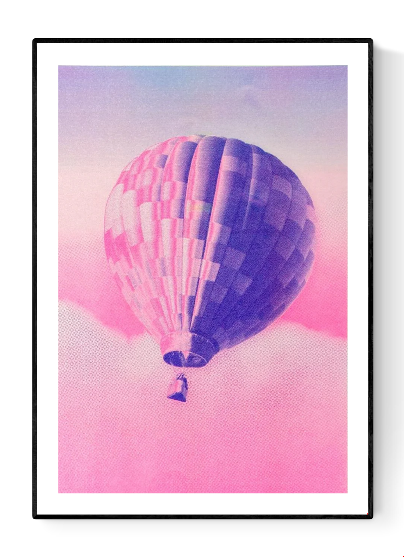 A3 risograph print of a pink and blue hot air balloon floating over dreamy clouds by PTRVRKD, hand-printed on 300 gsm Biotop paper.