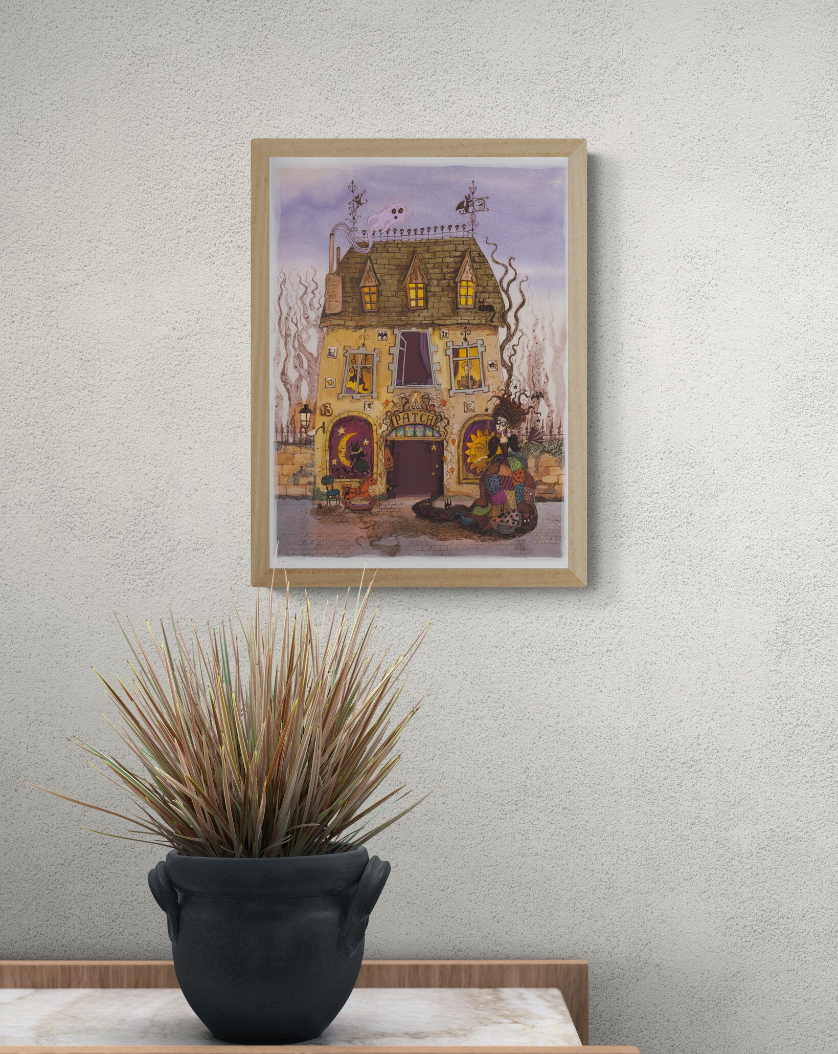 Whimsical folklore-inspired illustration of a magical townhouse filled with cats, ghostly figures, and a patchwork-dressed character. Detailed fantasy giclée print in soft purple, beige, orange, and black tones, vertical wall art for cozy home decor.