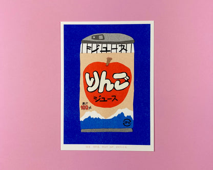 Colorful risograph print by We Are Out Of Office showing a can of Japanese apple juice with Mount Fuji in the background, printed in red, blue, and beige tones on eco-friendly paper – modern pop art wall decor for design lovers.