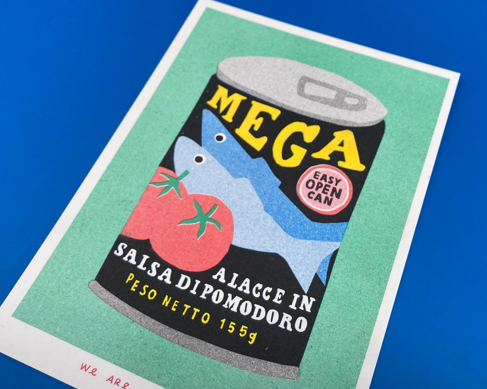 Colorful risograph print titled Can Mega Sardines by Dutch studio We Are Out Of Office, featuring a vintage-style sardine can design with tomatoes and bold typography, printed with eco-friendly soy inks on Biotop 300g paper — perfect for modern kitchen or pop art lovers.