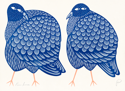 Two plump pigeons illustrated in deep blue and pale blue with peach legs, detailed patterned feathers and playful expressions, horizontal A3 risograph wall art for colourful modern interiors.