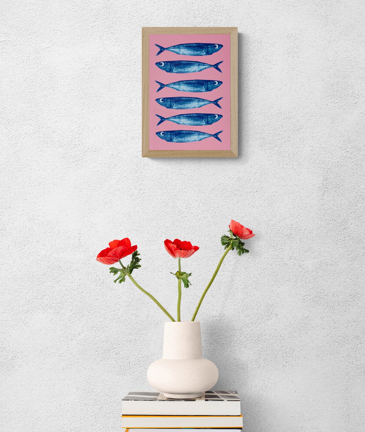 Sardines art print by PTRVRKD, blue fish on pink background, pop art seafood illustration A5, modern graphic wall art.