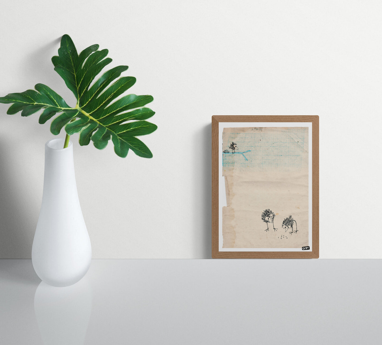 Minimalist bird illustration by Belgian artist Gert Paenen featuring hand-drawn quirky birds on textured vintage-style paper with blue grid details, contemporary digital art print for playful modern interiors.