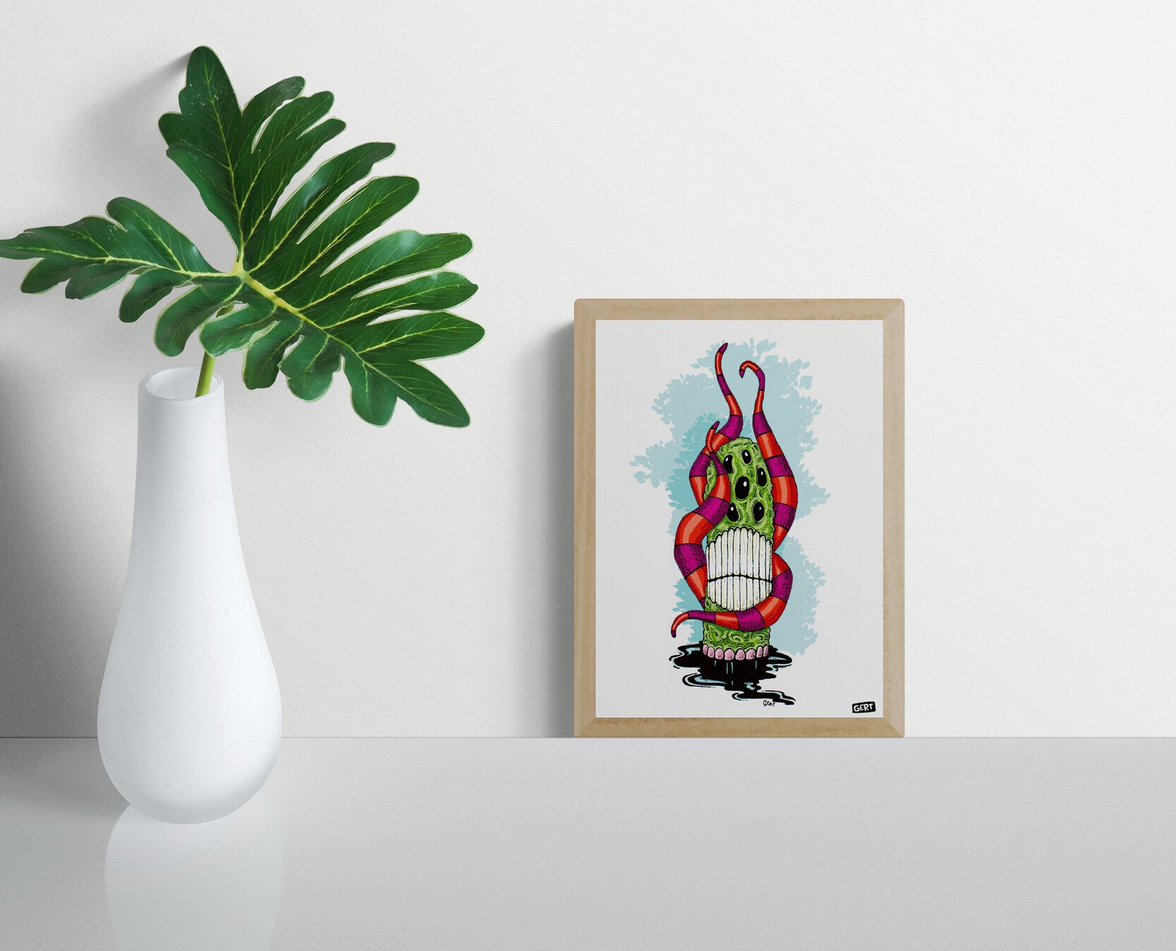 Monster 4 by Gert Paenen, surreal monster illustration with multiple eyes, striped tentacles, large teeth and vibrant colors, contemporary digital art print for modern wall decor and creative interiors.