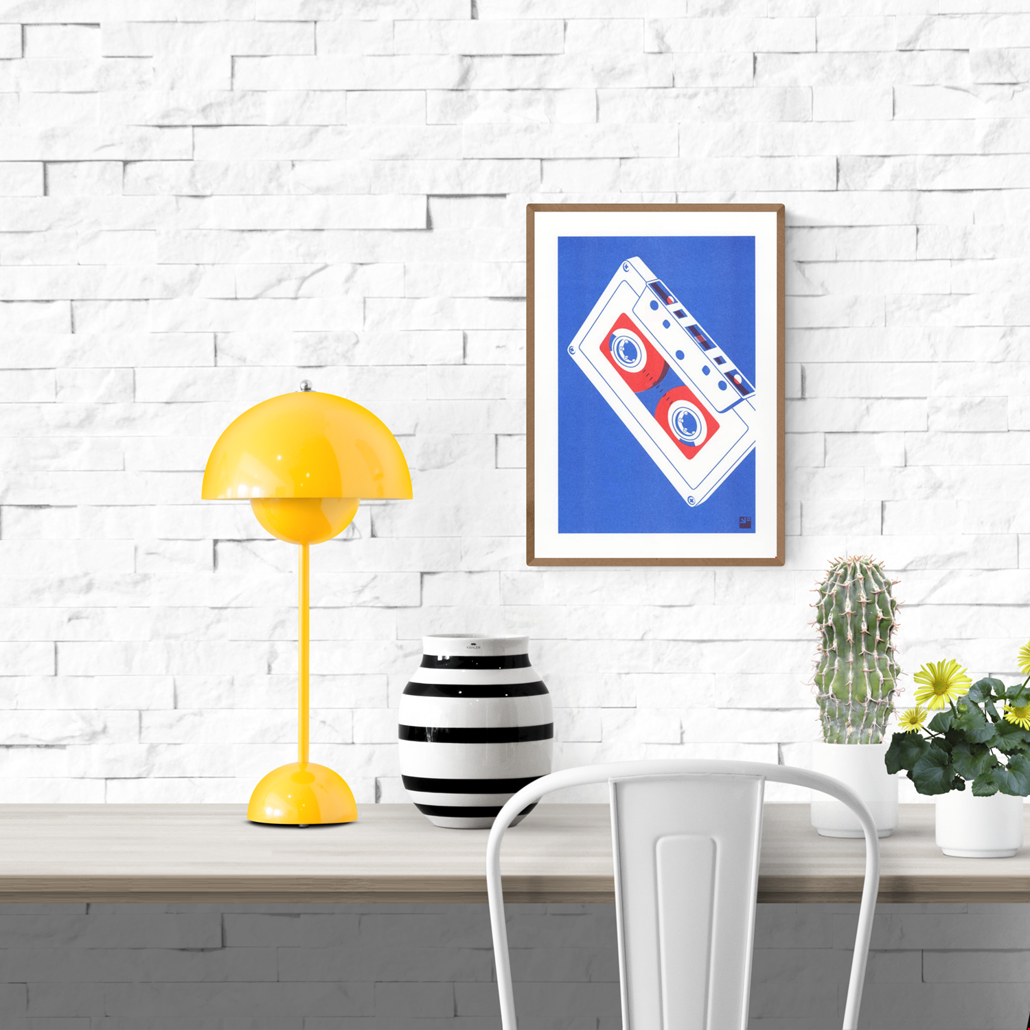 Minimalist risograph art print of a vintage cassette tape in red and blue tones by VrijFormaat. Retro-inspired wall art celebrating analog design, printed on 160g Biotop paper in Utrecht, Netherlands. Perfect for design lovers and music enthusiasts.